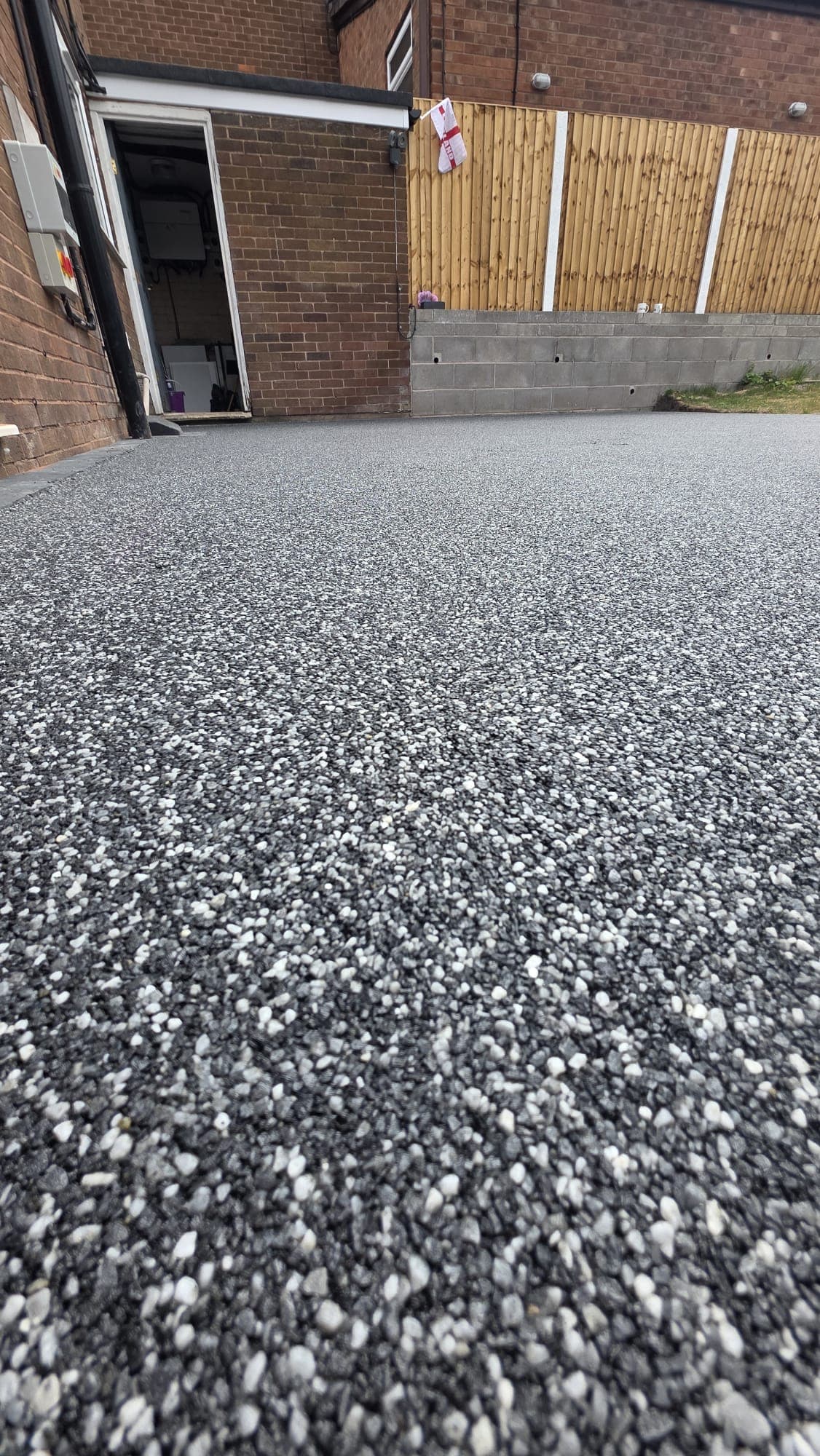 Close-up of a completed grey resin surface by Tru-Pro Landscapes